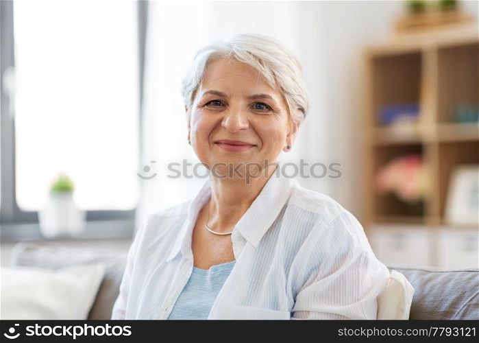 emotion, age and people concept - portrait of happy senior woman laughing. portrait of happy senior woman laughing