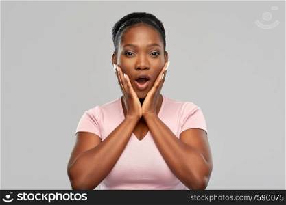 emotion, expression and people concept - shocked african american woman with open mouth over grey background. shocked african american woman with open mouth