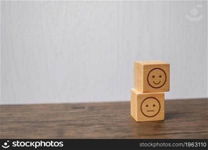 emotion face symbol on wooden blocks. mood, Service rating, ranking, customer review, satisfaction, evaluation and feedback concept