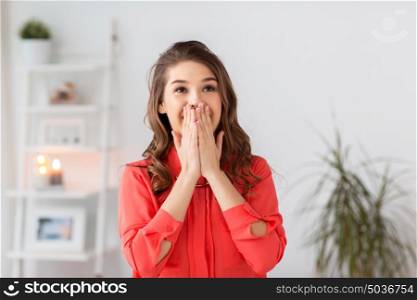 emotion, facial expression people concept - happy young woman at home. happy young woman at home
