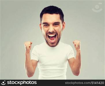 emotion, success, gesture and people concept - young man celebrating victory and screaming over gray background (funny cartoon style character with big head). young man celebrating victory over gray