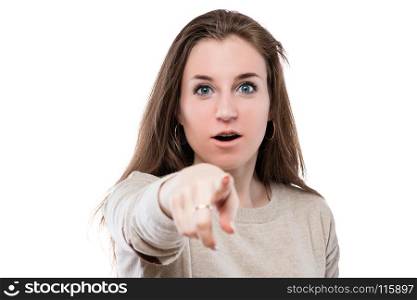 emotional beautiful girl shows a finger at you, portrait is isolated