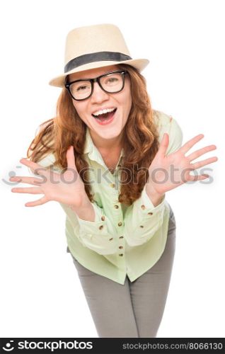 emotional girl in glasses and a hat on a white background
