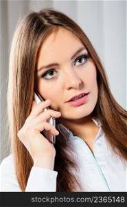 Emotions and communication message. Young stressed woman talk make a phone call cell phone argue.. Serious young woman make phone call.