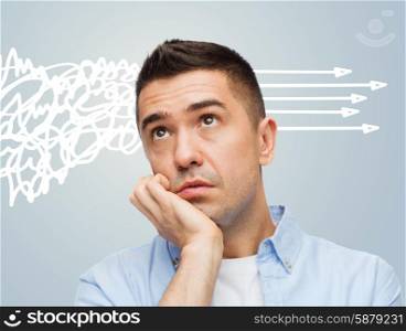 emotions, chaos and people concept - bored middle aged man over gray background