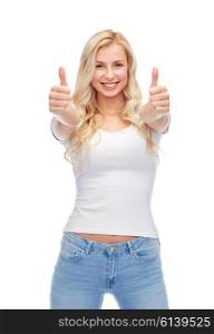 emotions, expressions, advertisement and people concept - happy smiling young woman or teenage girl in white t-shirt showing thumbs up with both hands