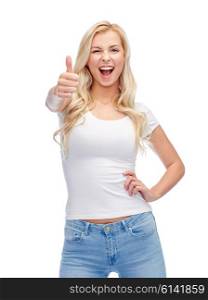 emotions, expressions, advertisement and people concept - happy smiling young woman or teenage girl in white t-shirt showing thumbs up