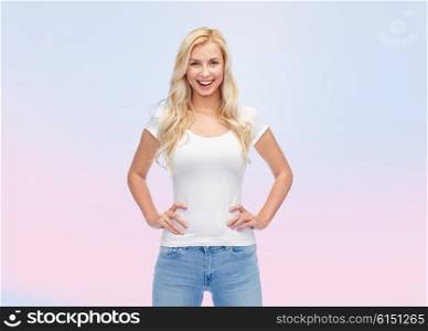 emotions, expressions, advertisement and people concept - happy smiling young woman or teenage girl in white t-shirt over rose quartz and serenity gradient background