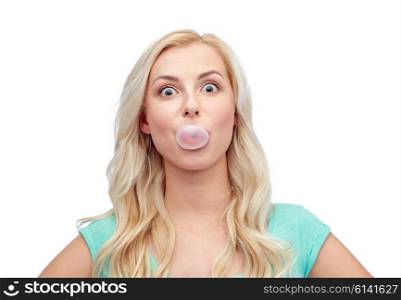 emotions, expressions and people concept - happy young woman or teenage girl chewing gum