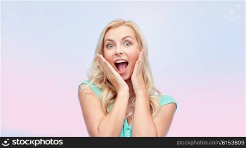 emotions, expressions and people concept - surprised smiling young woman or teenage girl over rose quartz and serenity gradient background