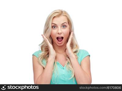 emotions, expressions and people concept - surprised smiling young woman or teenage girl