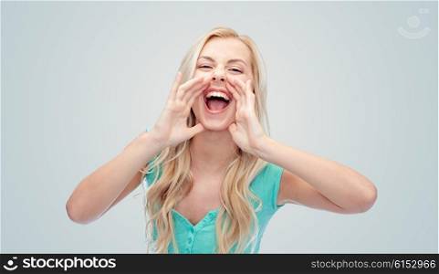 emotions, expressions and people concept - young woman or teenage girl shouting