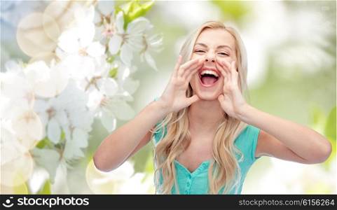 emotions, expressions and people concept - young woman or teenage girl shouting over natural spring background