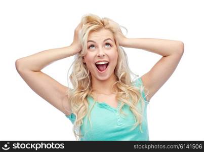 emotions, expressions, hairstyle and people concept - smiling young woman or teenage girl holding to her head or touching hair