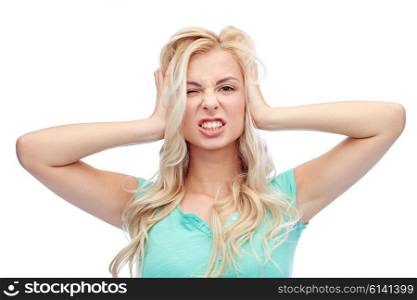 emotions, expressions, hairstyle and people concept - young woman holding to her head and screaming