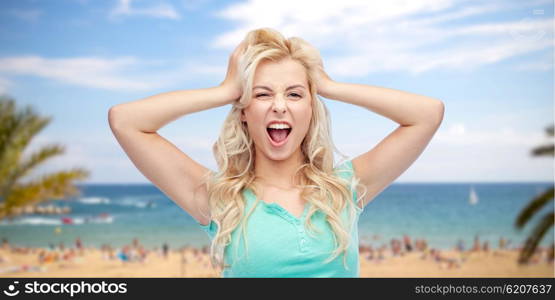 emotions, expressions, summer holidays, travel and people concept - smiling young woman or teenage girl holding to her head or touching hair over tropical beach with palm trees and sea background