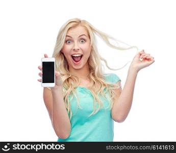 emotions, expressions, technology and people concept - smiling young woman or teenage girl showing blank smartphone screen