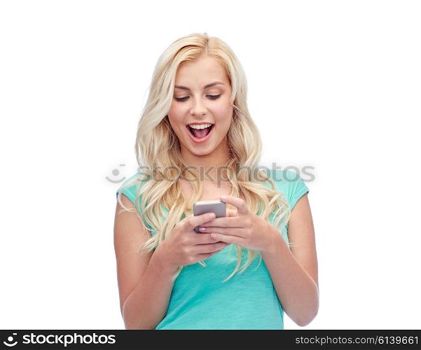 emotions, expressions, technology and people concept - smiling young woman or teenage girl texting on smartphone