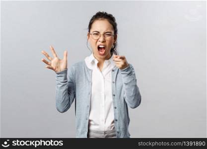 Emotions, family therapy and lifestyle concept. Its your fault. Angry asian woman blame her husband during argument, pointing finger with scold, accusing in cheating her, scream and arguing.. Emotions, family therapy and lifestyle concept. Its your fault. Angry asian woman blame her husband during argument, pointing finger with scold, accusing in cheating her, scream and arguing