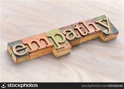 empathy word abstract in letterpress wood type blocks stained by color inks