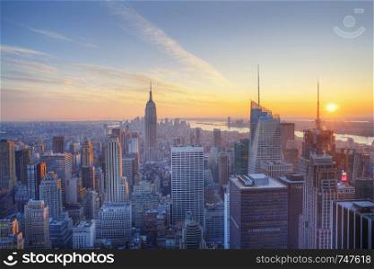 Empire State building and Manahtten at sunset