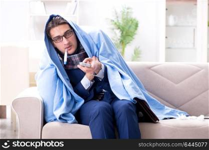 Employee businessman watching tv while being sick with flu