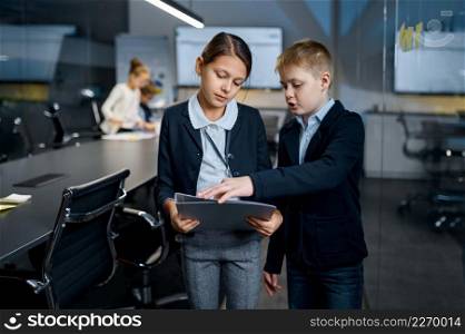 Employee colleague children preparing paperwork for meeting talking together at boardroom. Employee colleague children preparing paperwork for meeting