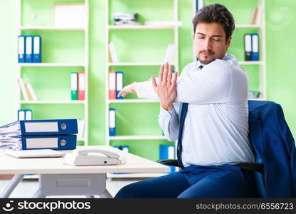 Employee doing exercises during break at work