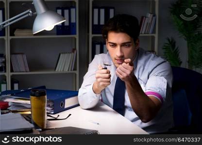 Employee relieving stress from overtime with drugs narcotics