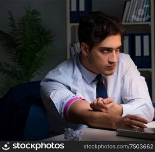 Employee relieving stress from overtime with drugs narcotics. The employee relieving stress from overtime with drugs narcotics