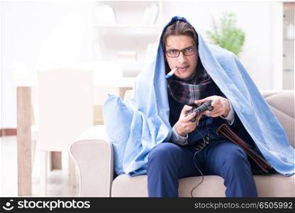 Employee suffering from flue playing computer game at home