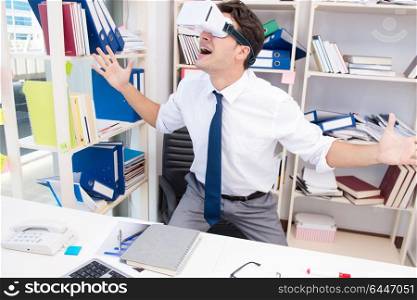 Employee watching movie on vr virtual reality glasses