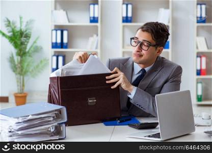 Employee with too much work taking it home