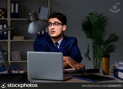 Employee working late to finish important deliverable task