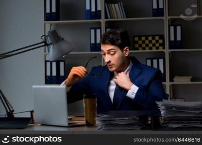 Employee working late to finish important deliverable task