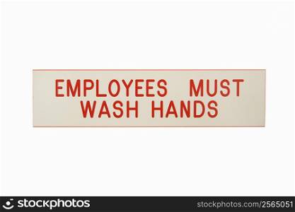 Employees must wash hands sign against white background.