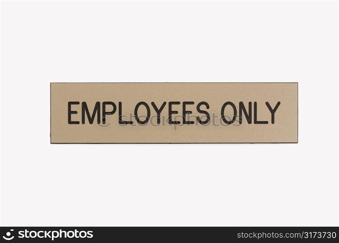Employees only sign on white background.