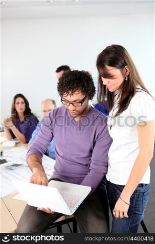 employees watching a computer