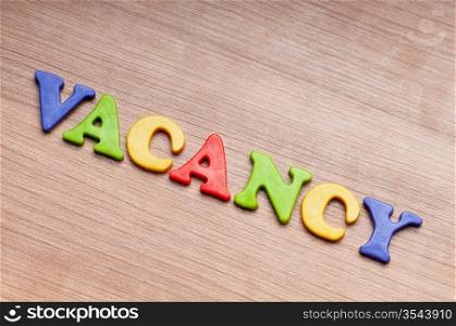 Employment concept with letters on background