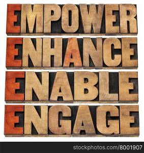 empower, enhance, enable and engage - motivational leadership and business concept - a collage of isolated words in letterpress wood type stained by red ink