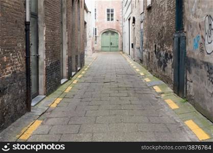 Empty and Paved Stone Alleyway
