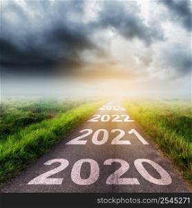 Empty asphalt road and New year 2020 concept. Driving on an empty road to Goals 2020.