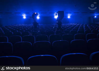 empty auditorium with seats before the start of the performance