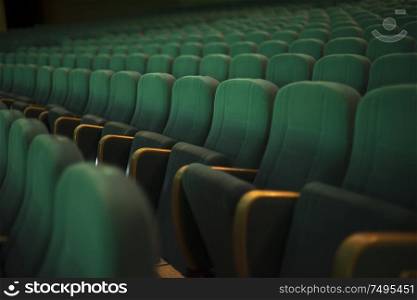 empty auditorium with seats before the start of the performance