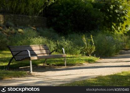 Empty bench in a park, Le Mans, Sarthe, Pays-de-la-Loire, France