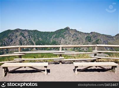 Empty bench in front of volcano Vesuvius crater. This bench is used during trekking