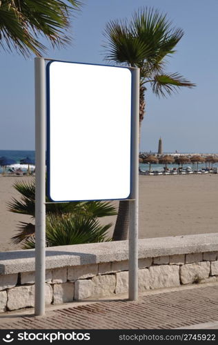 empty billboard and sidewalk at the beach