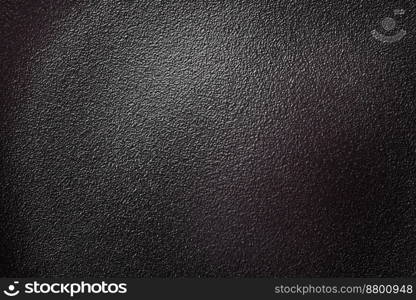 Empty black ceramic plate on a dark concrete background. Preparing the table for a family dinner