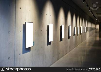 Empty blank white isolated frame on wall