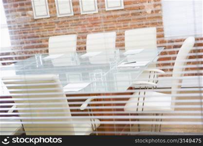 Empty boardroom through a window